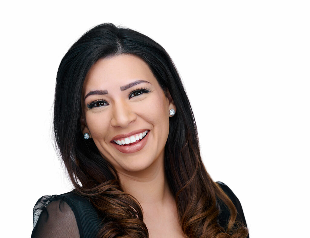 Professional headshot of a smiling human resources representative against a bright white background in St. Louis, Missouri.
